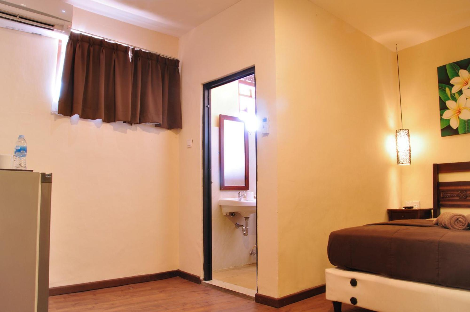 Bemo Corner Guest House Kuta  Bilik gambar